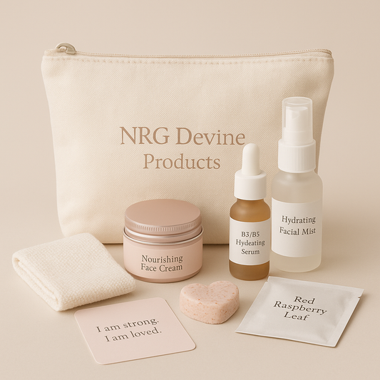 Postpartum self-care kit with calico bag, face cream in pink tin, hydrating serum, facial mist, bubble bath cookie, face cloth, tea sachet, and affirmation card. Designed for new mums. Essential oil-free.